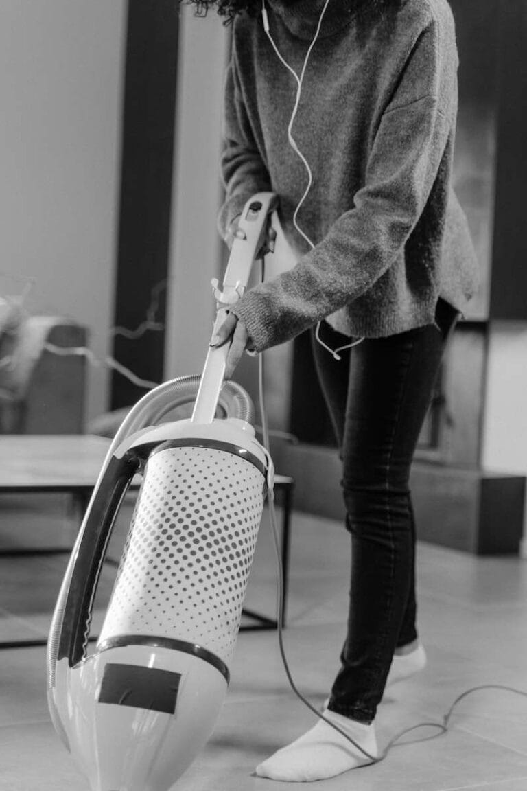 Can You Use Dettol To Clean Floors 10 Grayscale Photo of a Person Cleaning using a Vacuum Cleaner