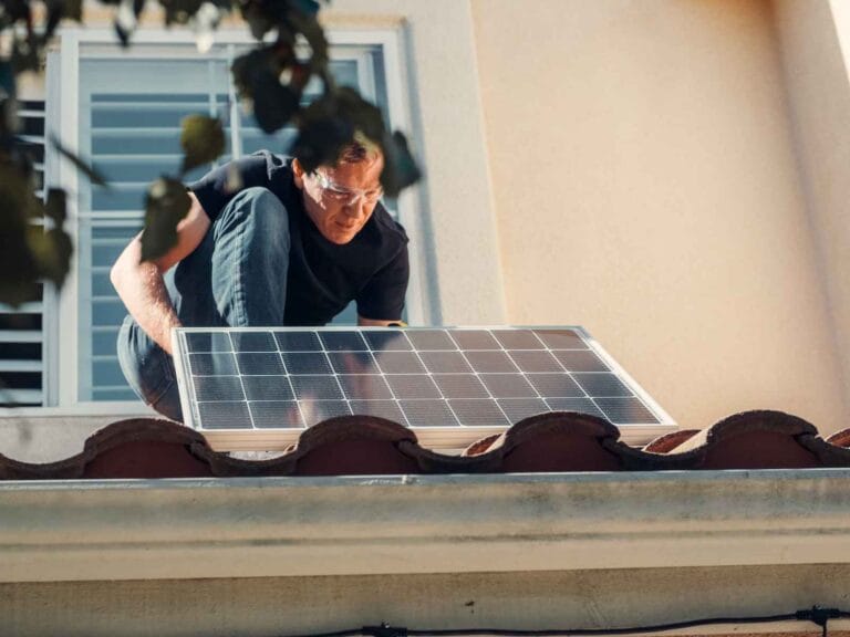 How To Use Dettol Disinfectant Liquid 5 A Man in Black Shirt Installing a Solar Panel on the Roof