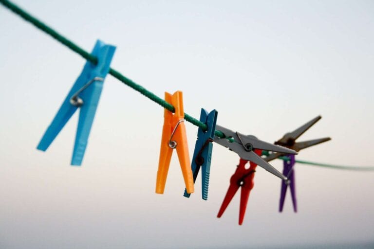 Keep It Fresh: How To Sanitize With Boiling Water 8 seven assorted-color clothes pegs hanging on rope
