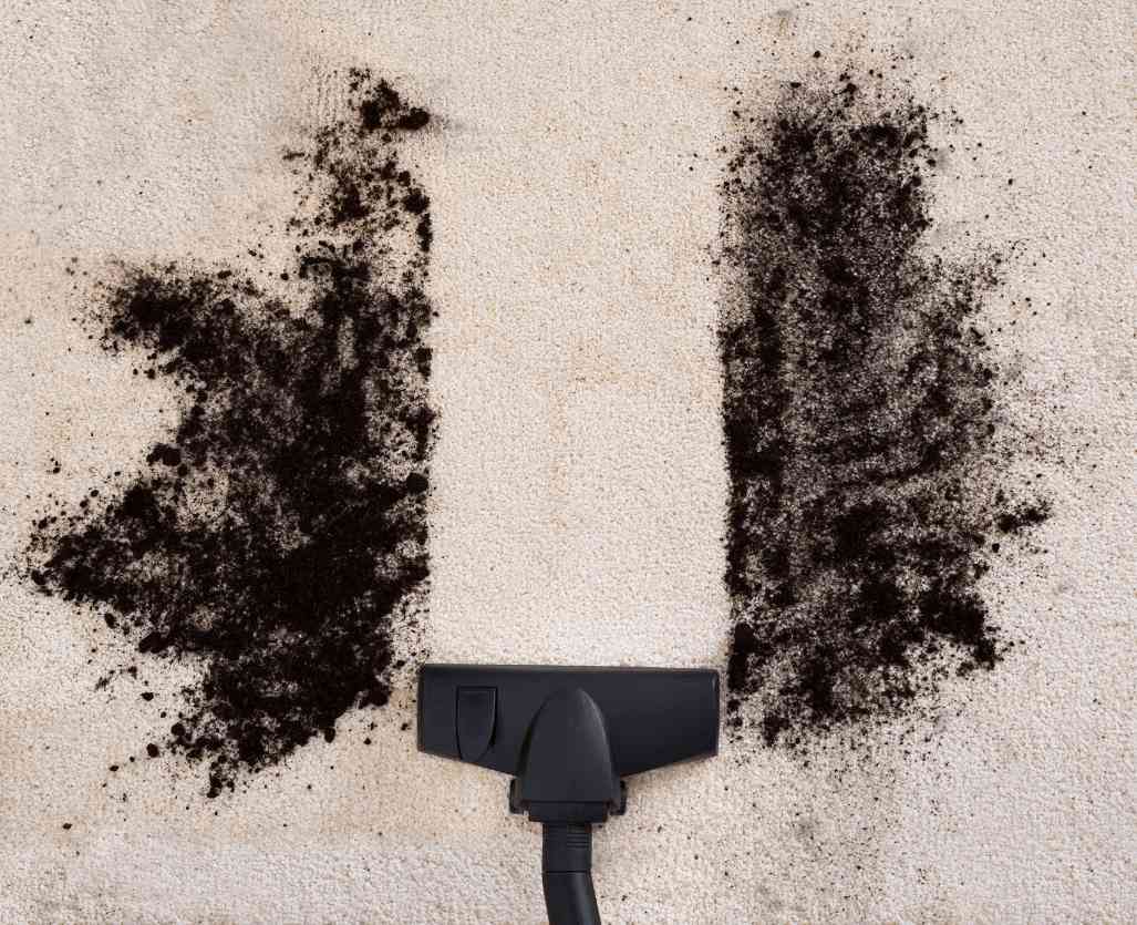 Rug Cleaning 10 dirty carpet being cleaned with vacuum
