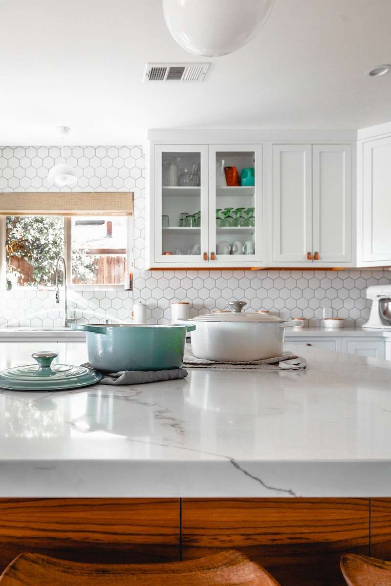 Is Steam Cleaning Safe for Porcelain Tiles? Find Out Now! 1 two cooking pots on kitchen island
