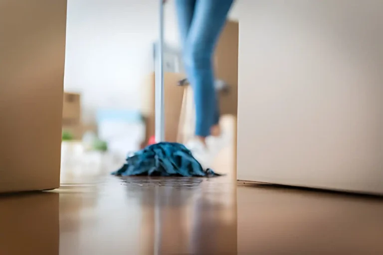 How to Get Your Deposit Back: Cleaning Guide for Tenants 6 Tenant cleaning her apartment